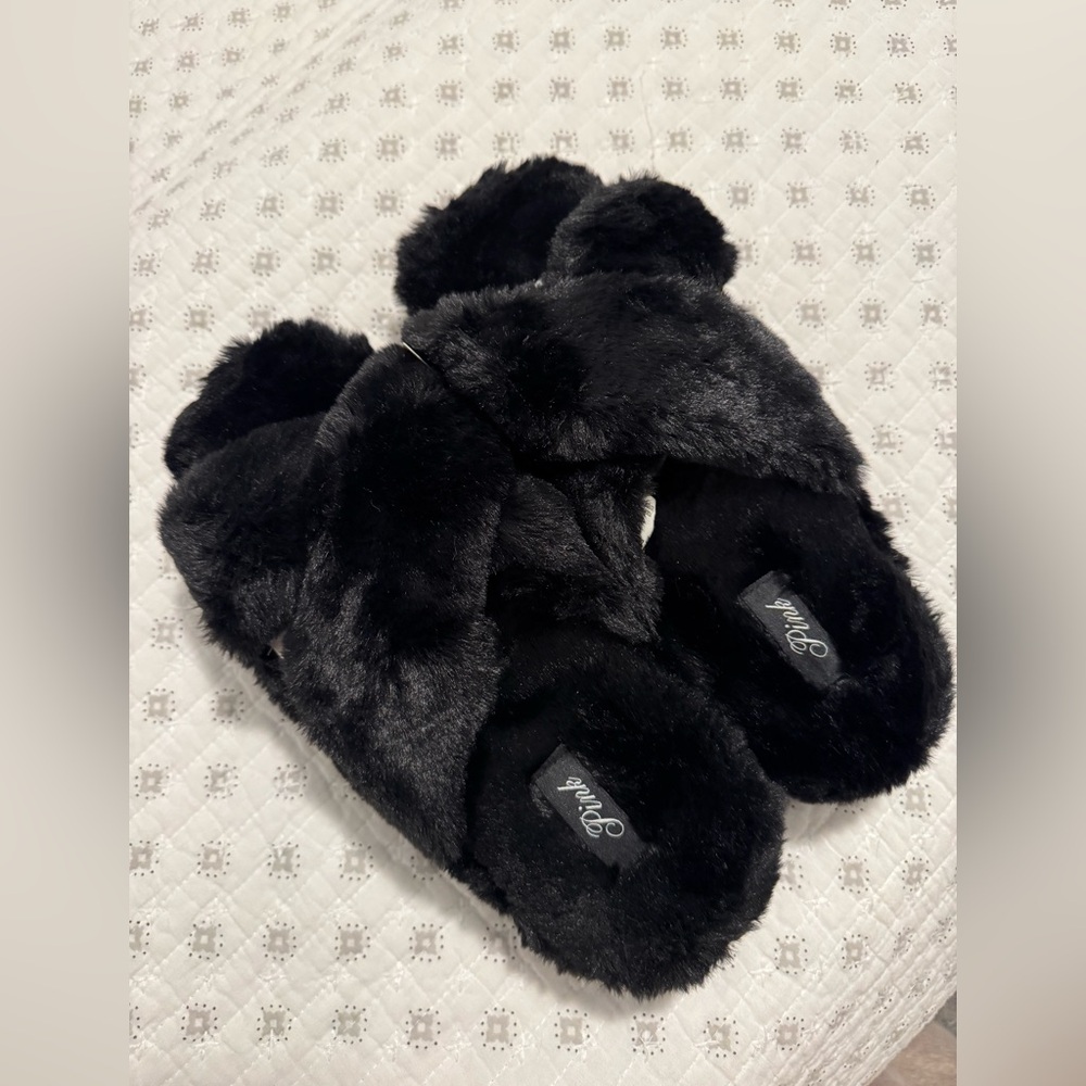Pink fuzzy slippers